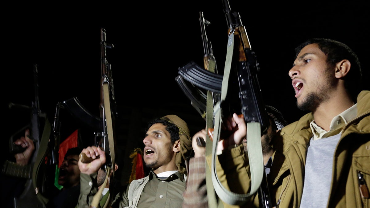 Houthi rebels with guns