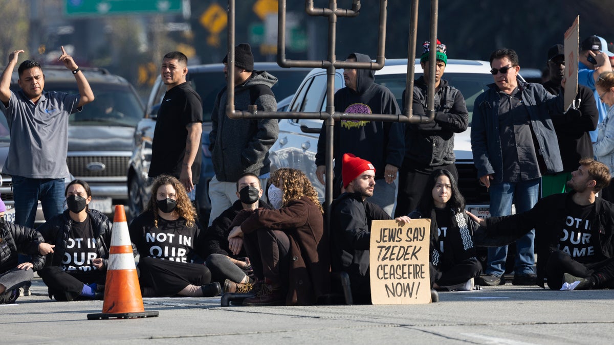 Jews for ceasefire protesters block freeway