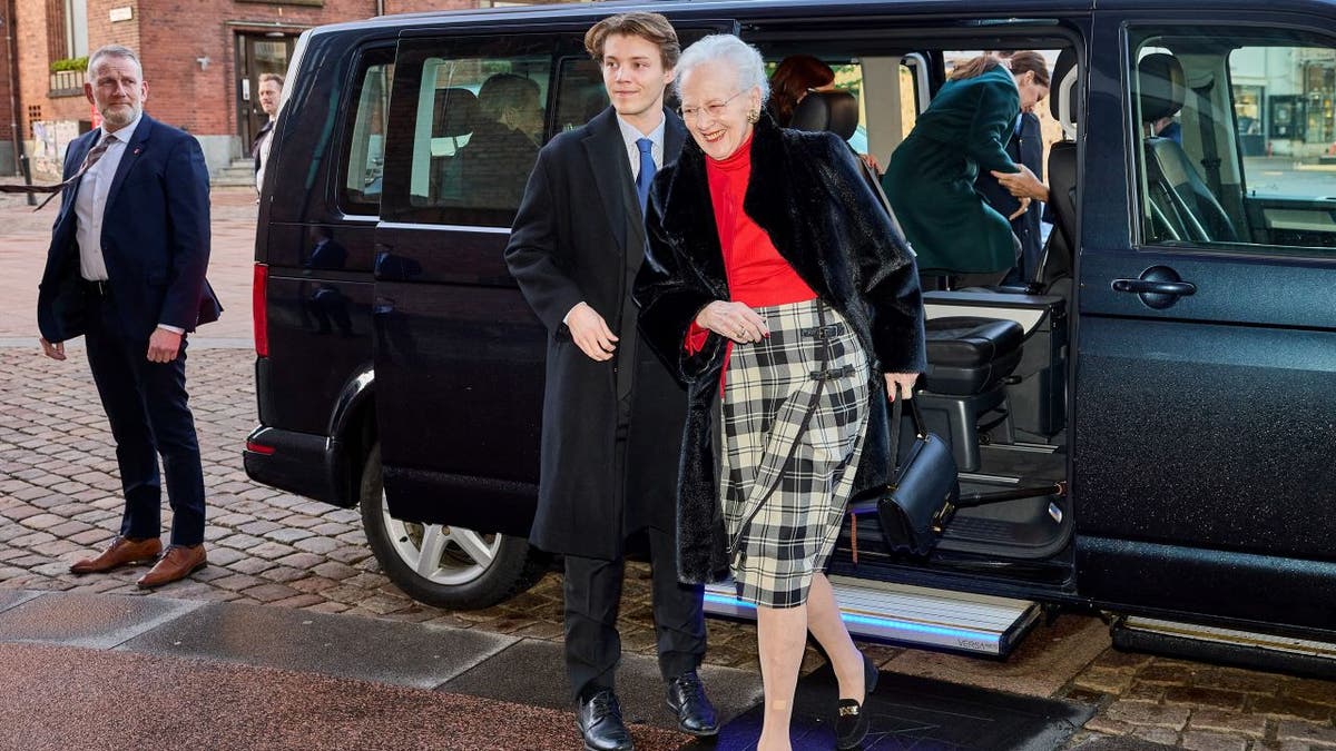 Queen Margrethe II of Denmark stepping out of car