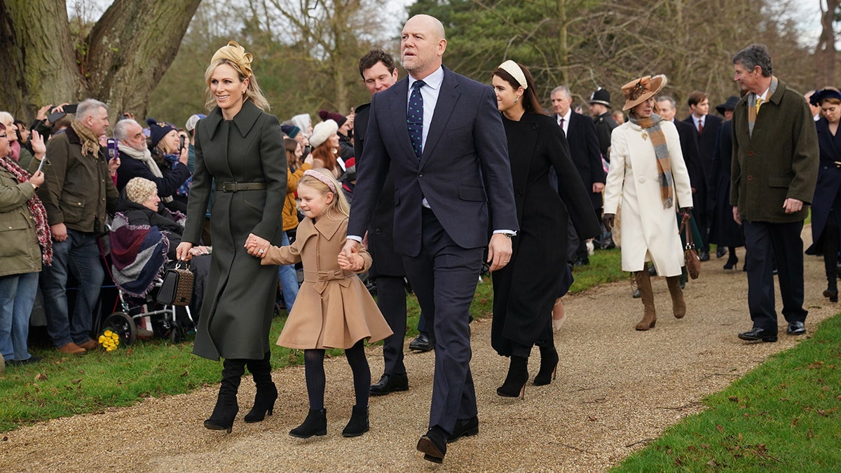 A photo of Zara, Mike Tindall with daughter