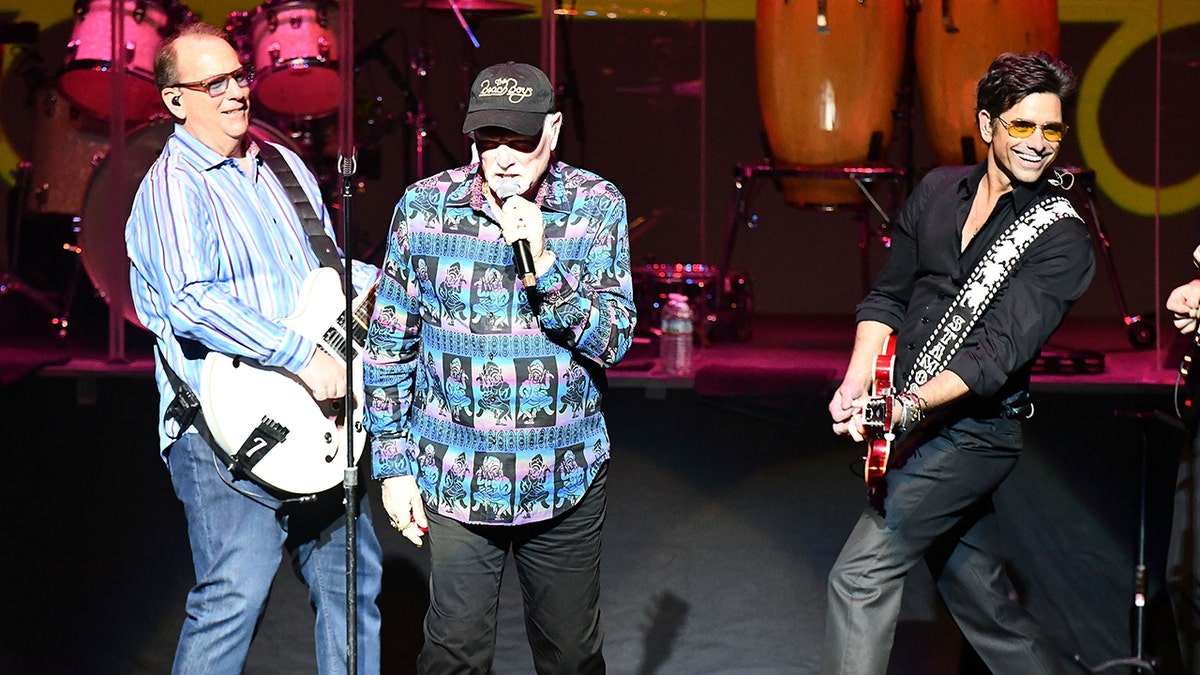 Photo of Jeffrey Foskett, Mike Love, and John Stamos