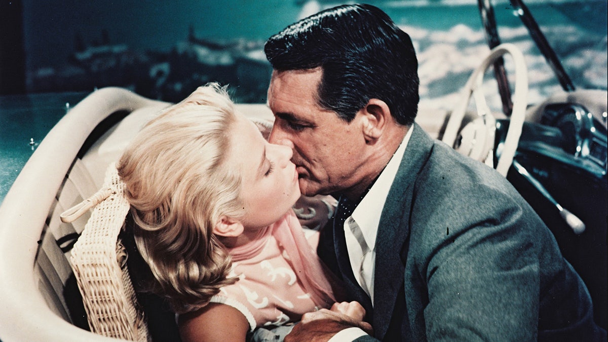 Grace Kelly kisses Cary Grant in a scene from the movie
