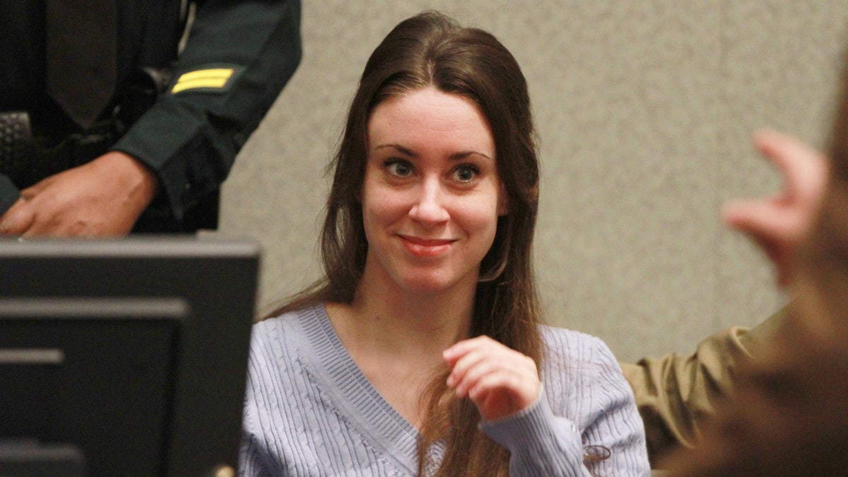 Casey Anthony smiling in court