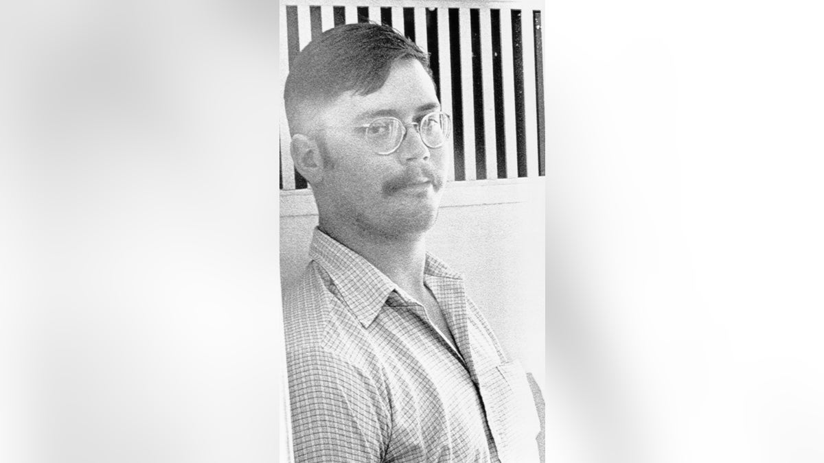 Edmund Kemper looking at the camera with a smirk