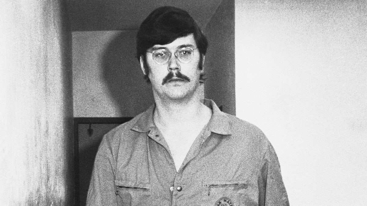 A close-up of Edmund Kemper in his jailhouse jumpsuit