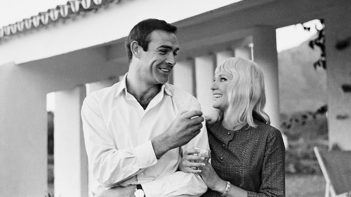 Sean Connery admiring his wife Diane Cilento