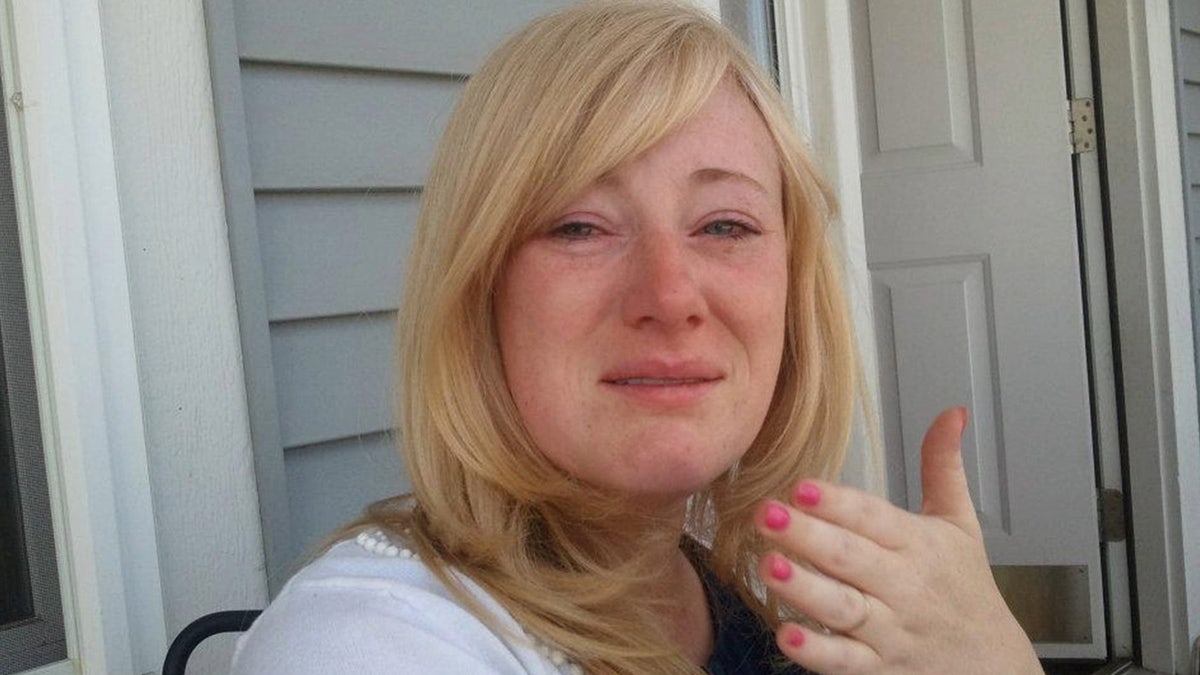 A close-up of Kristine Barnett crying