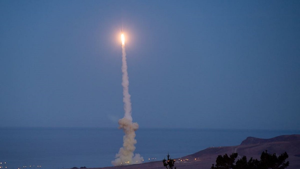 An image of a missle defense system test in the early morning