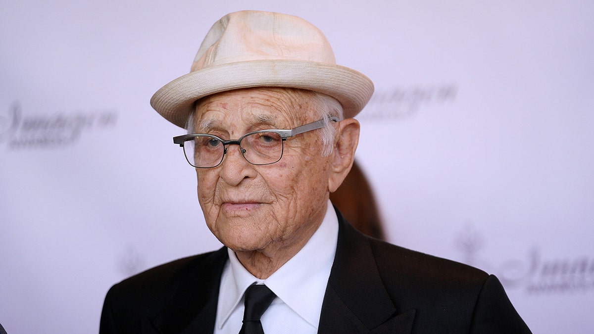Norman Lear wearing a hat