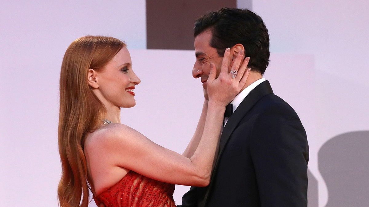 Jessica Chastain and Oscar Isaac on red carpet