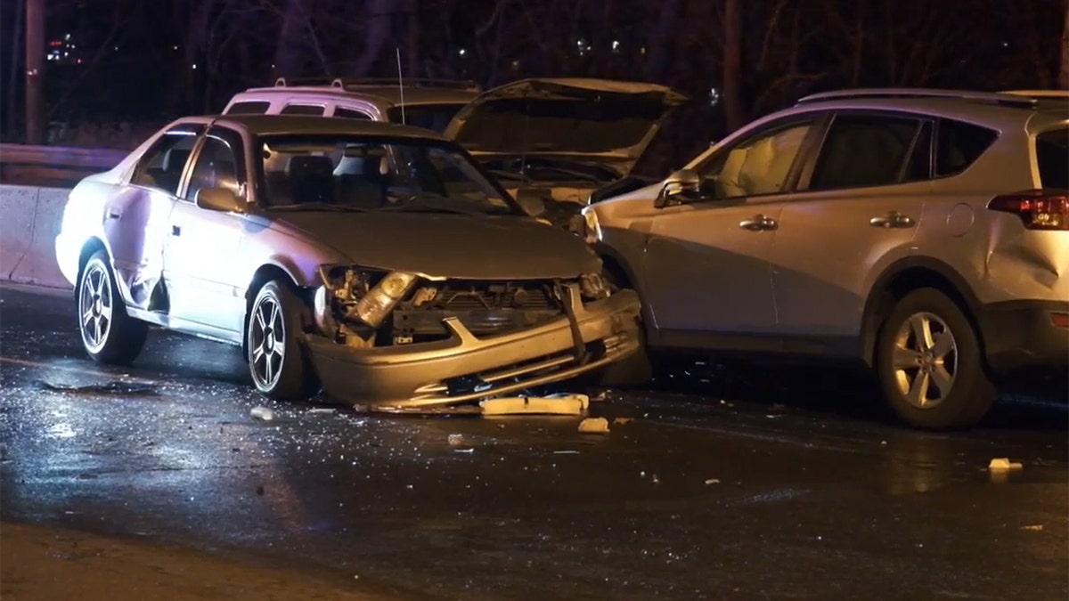 A damaged car at the scene of the Paterson 13-car pileup