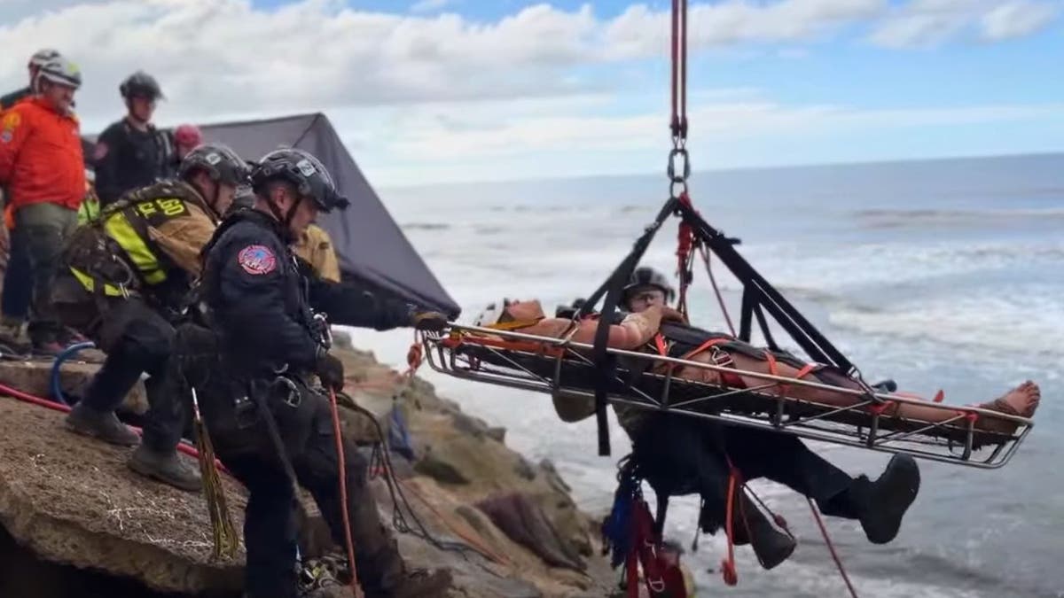 a man being airlifted to safety