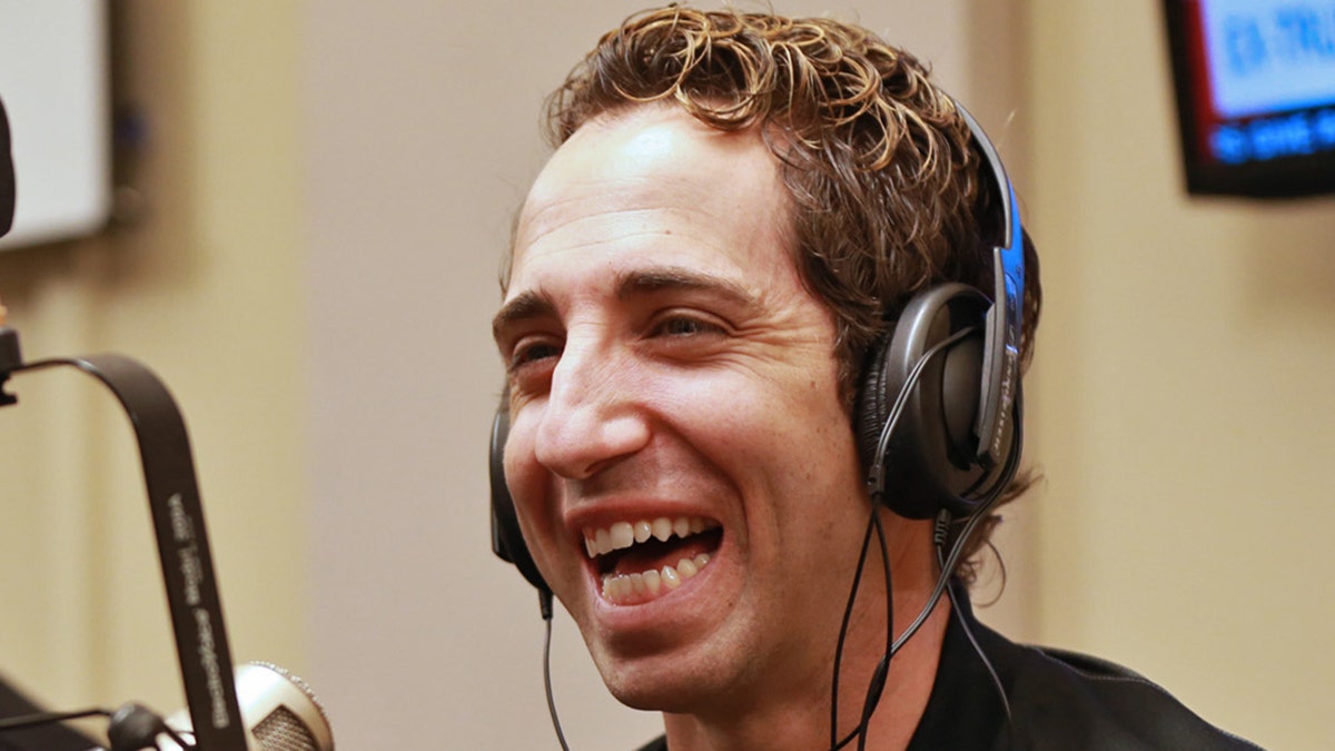 Sean Stellato with headphones on