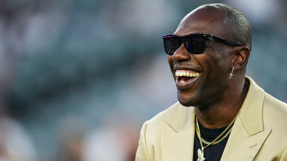 Terrell Owens laughs