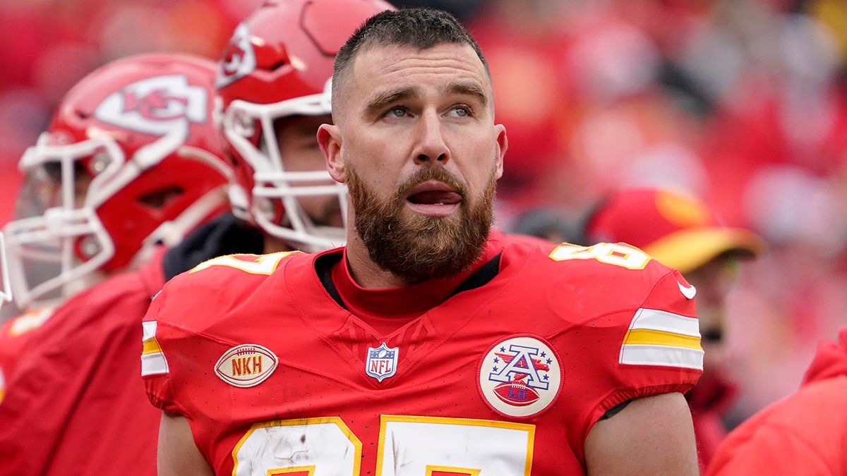 Travis Kelce looks on