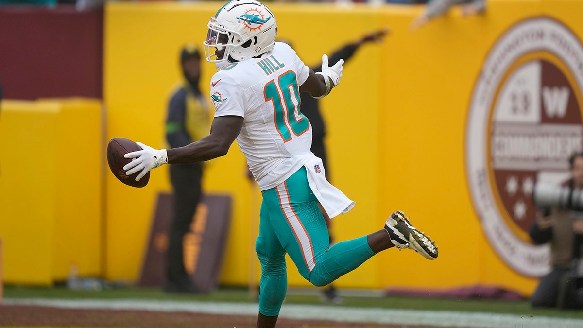 Tyreek Hill celebrates