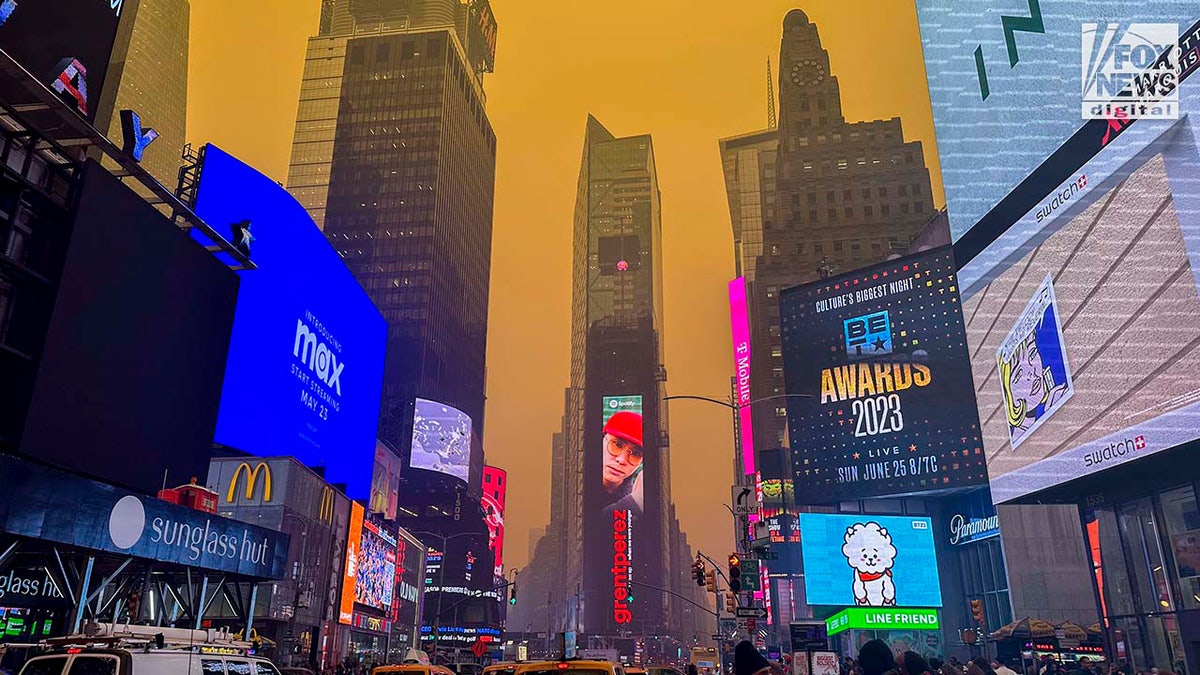 Smoke from Canadian wildfires loom over New York City's Times Square