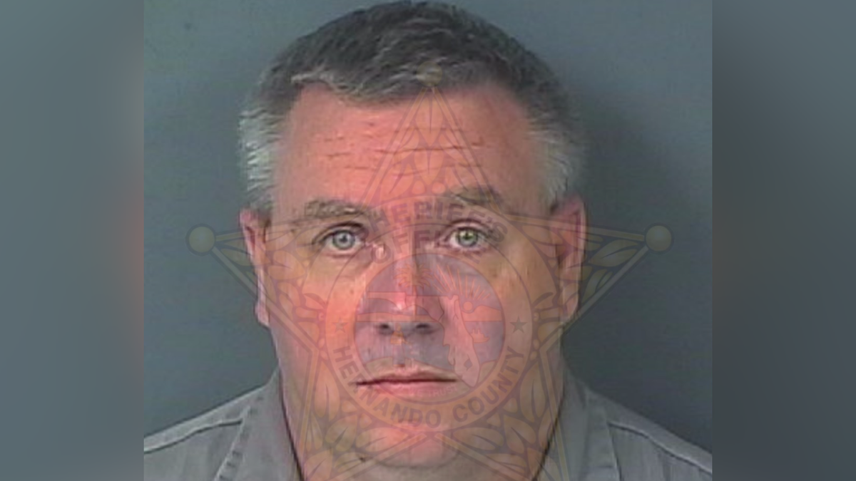 Michael Foster emotionless in booking picture