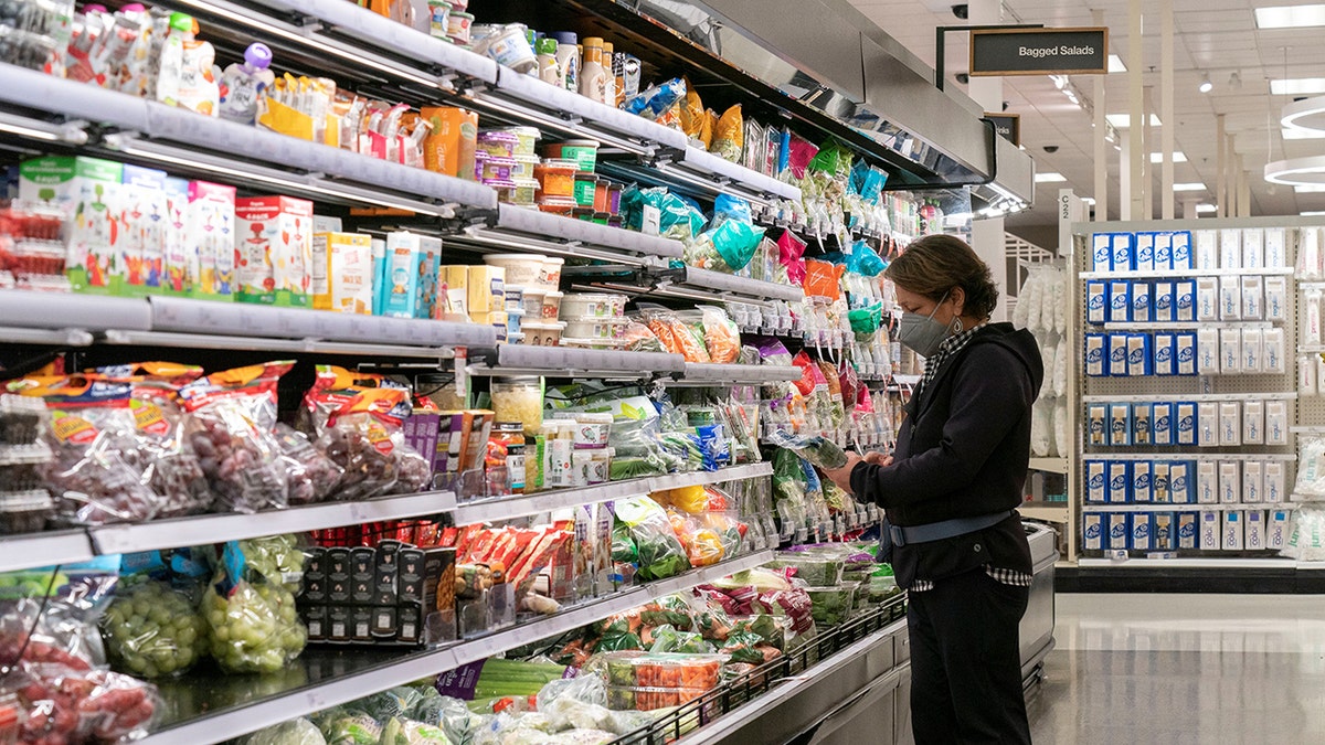 Woman shops at grocery store