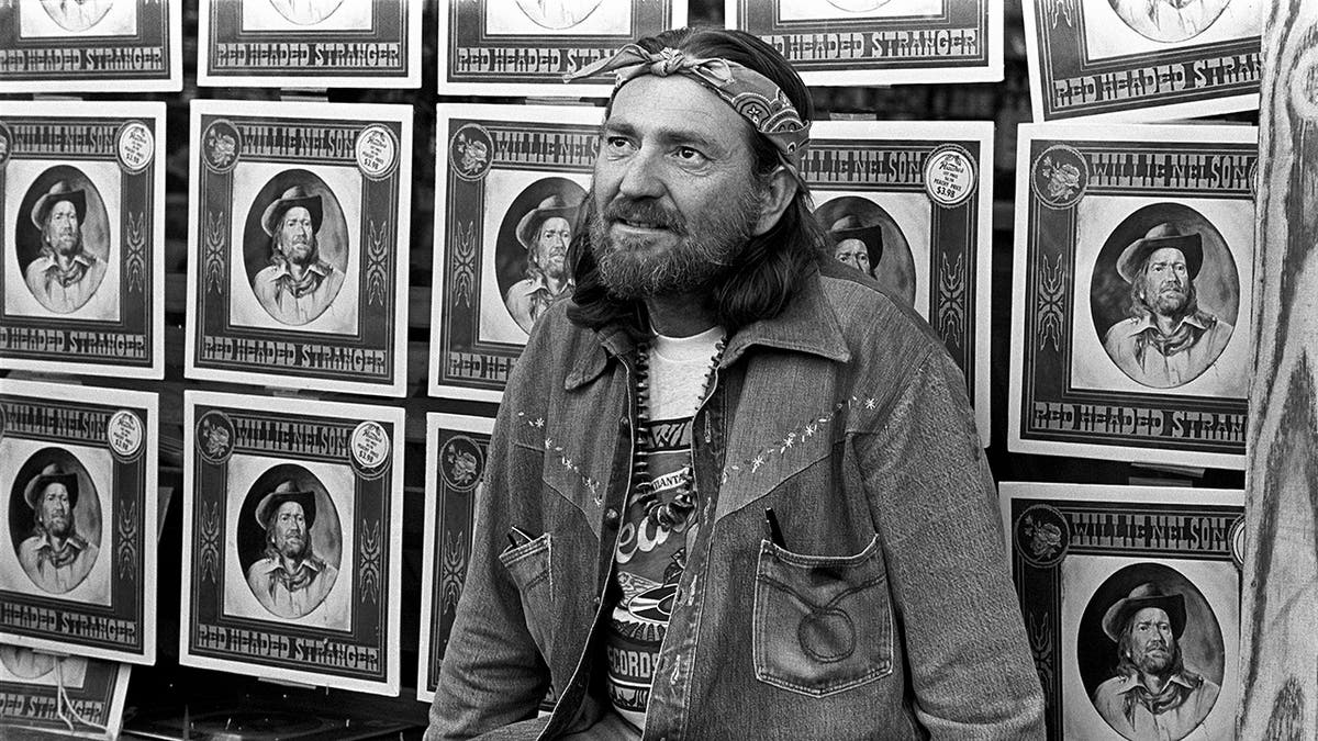 Willie Nelson posing in 1975