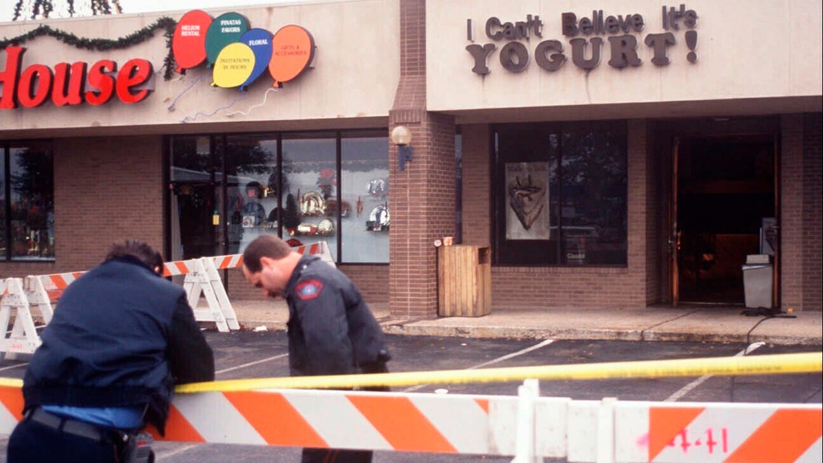 Officers at the scene of the Yogurt Shop murders