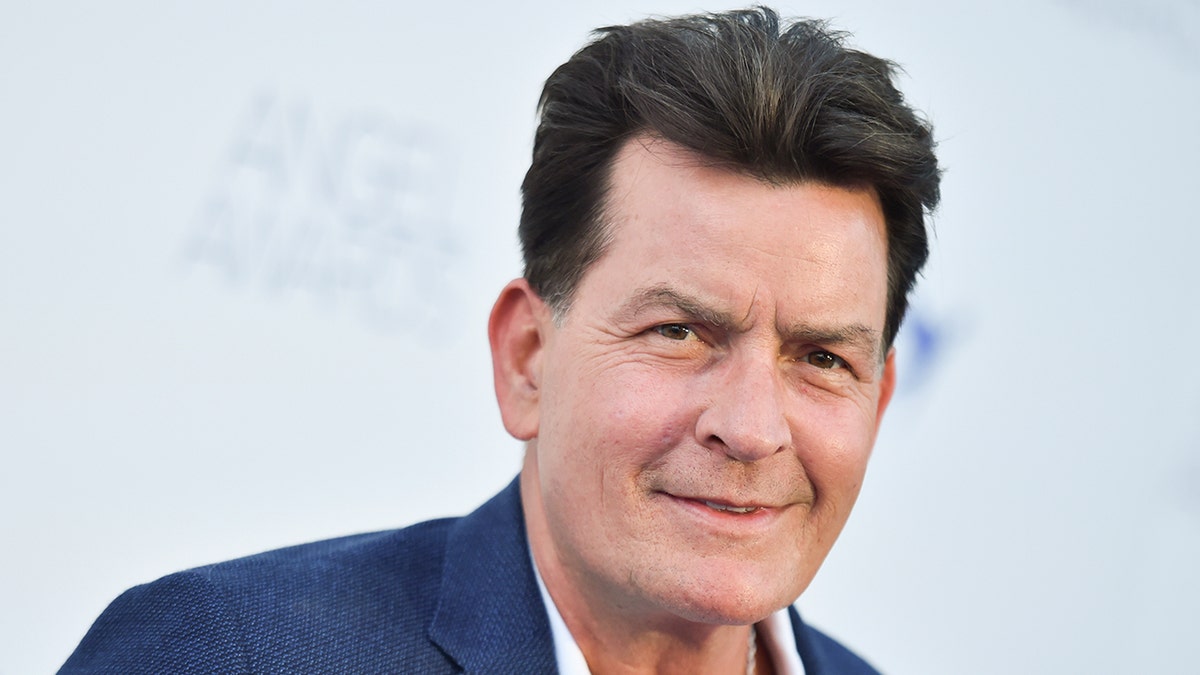 Charlie Sheen wears blue suit at charity event in Los Angeles