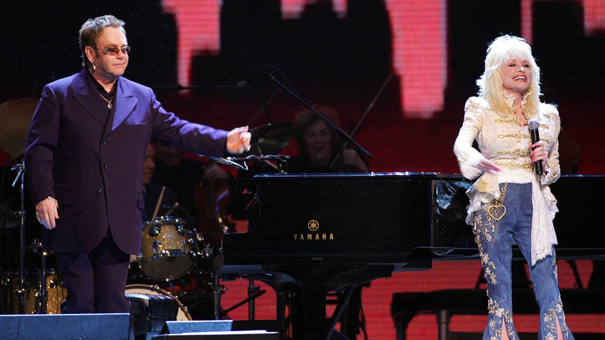 Dolly Parton performing with Elton John