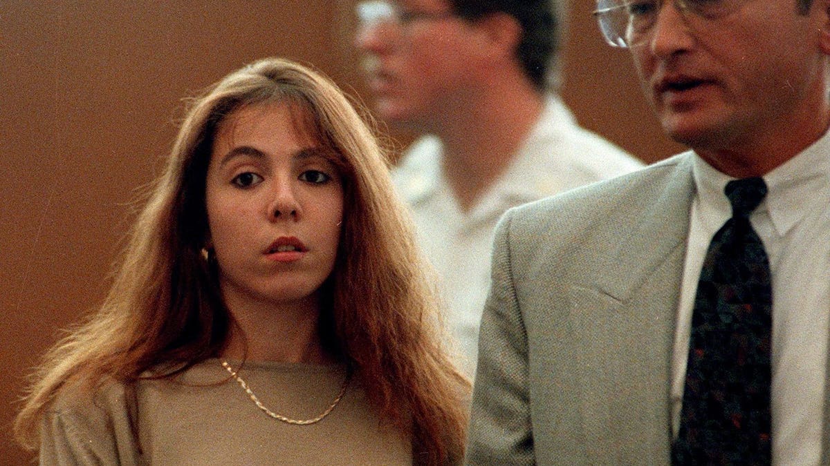 Amy Fisher (Left) in court with attorney (right)