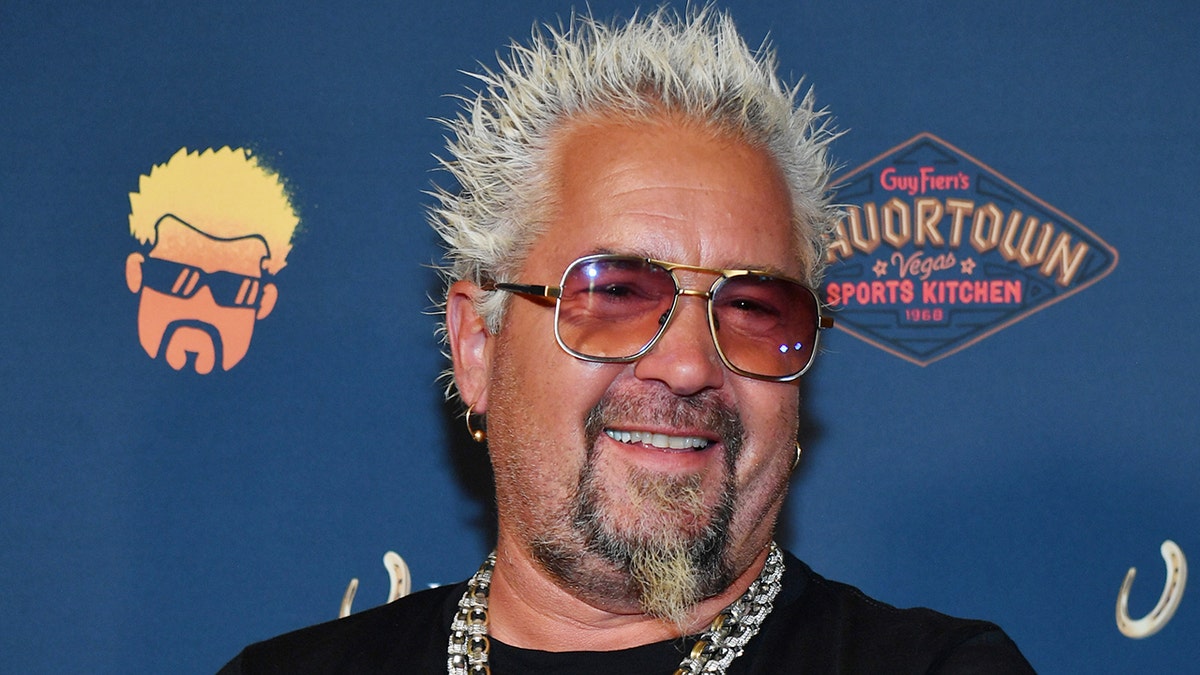 Guy Fieri smiles at Flavortown launch