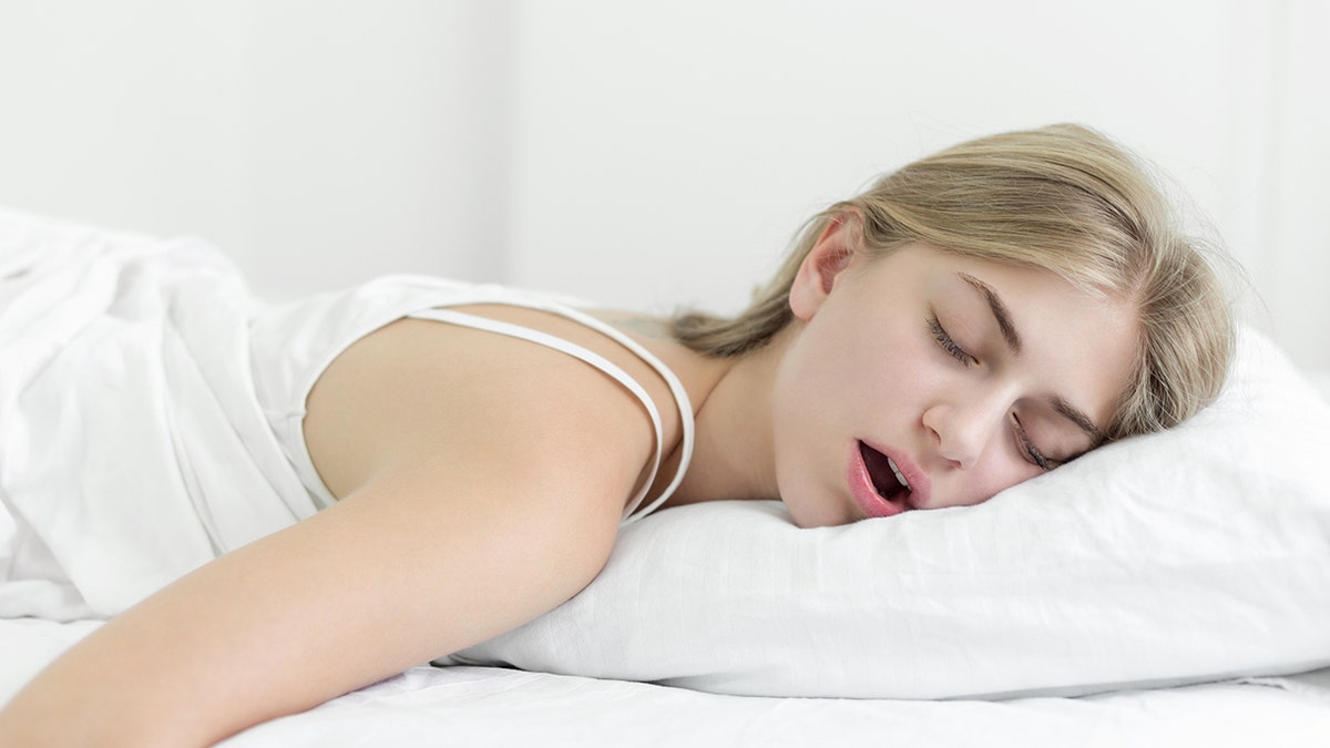 woman sleeps with mouth open