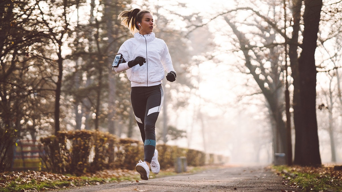 Woman running in the cold