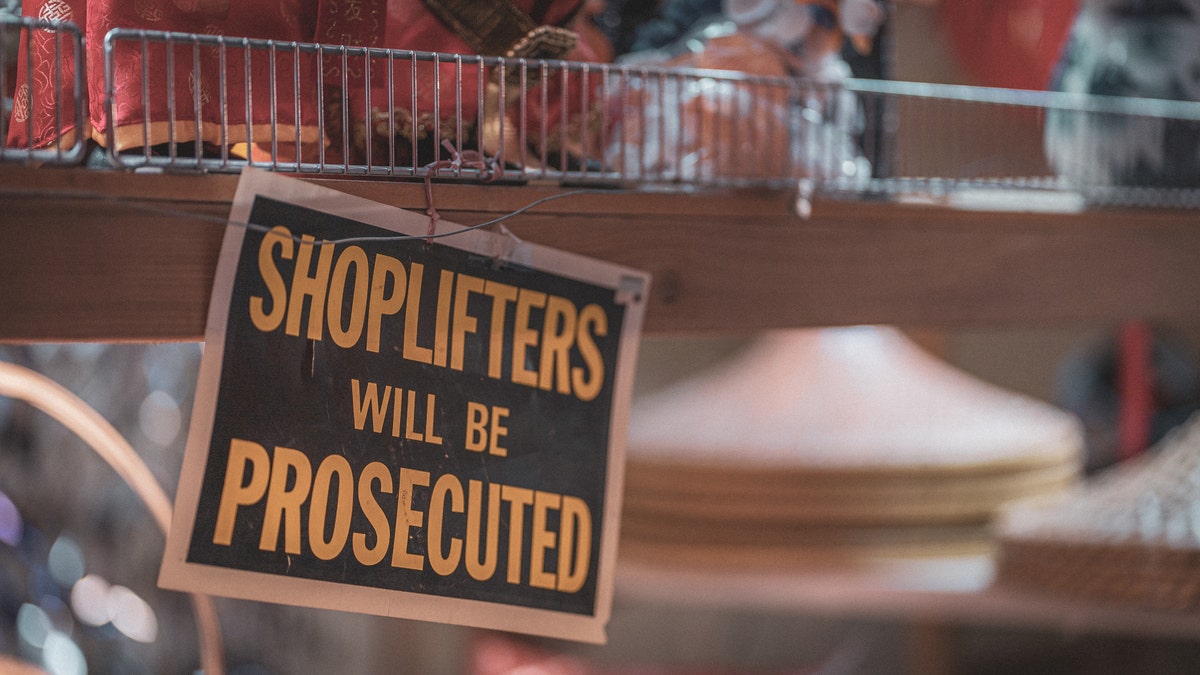 Shoplifters will be prosecuted sign in a store