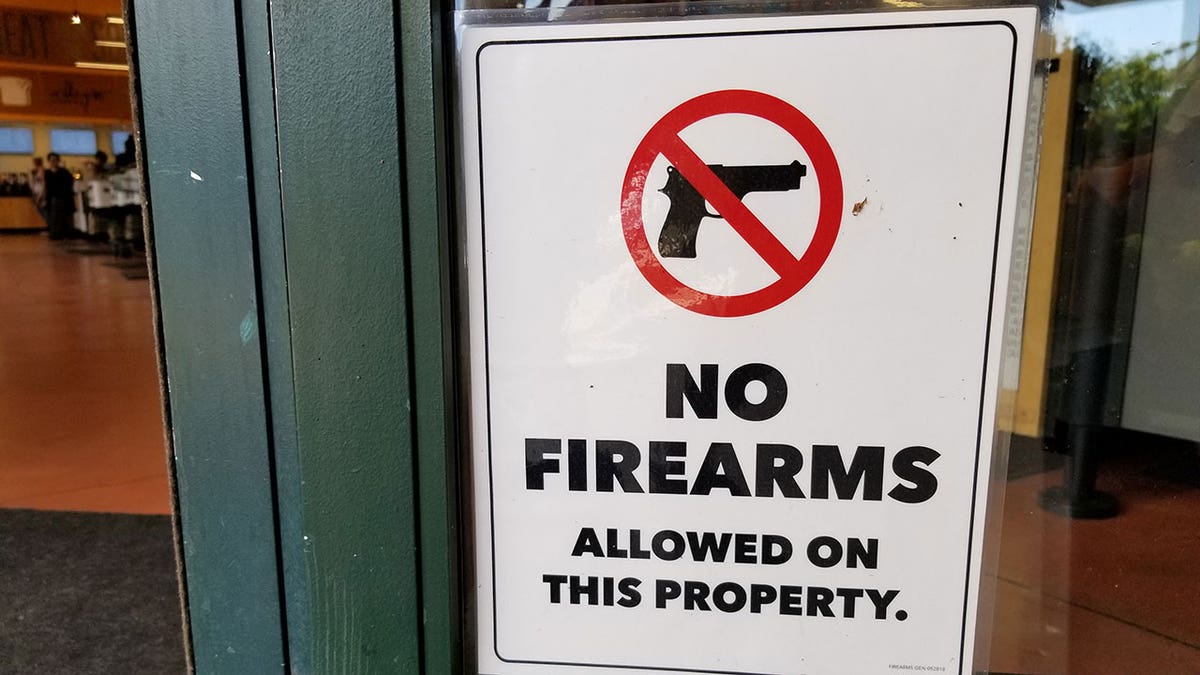 Signage declares no firearms allowed on private property