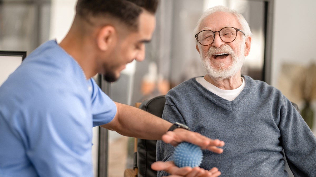 Nurse with older man