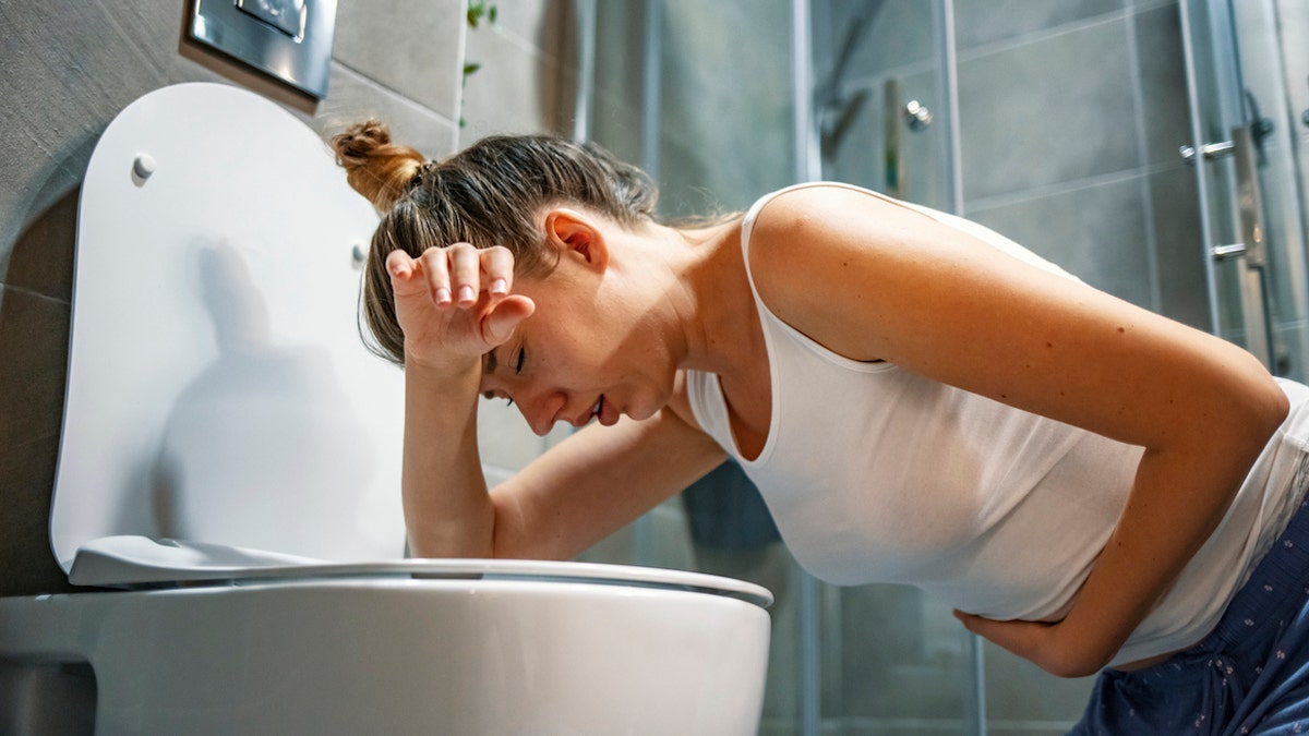 Pregnant woman vomiting