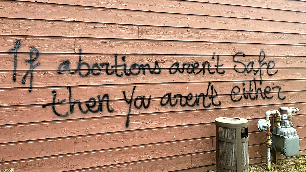 Graffiti that says "If abortions aren't safe then you aren't either."