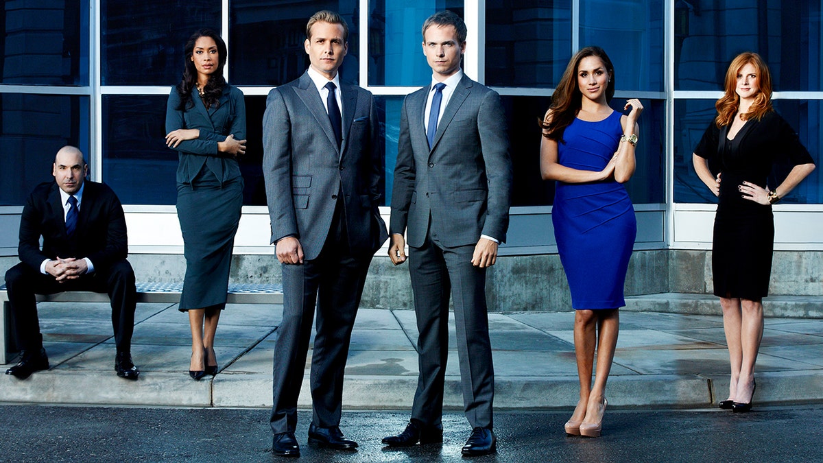 The cast of Suits in a promo for season 2