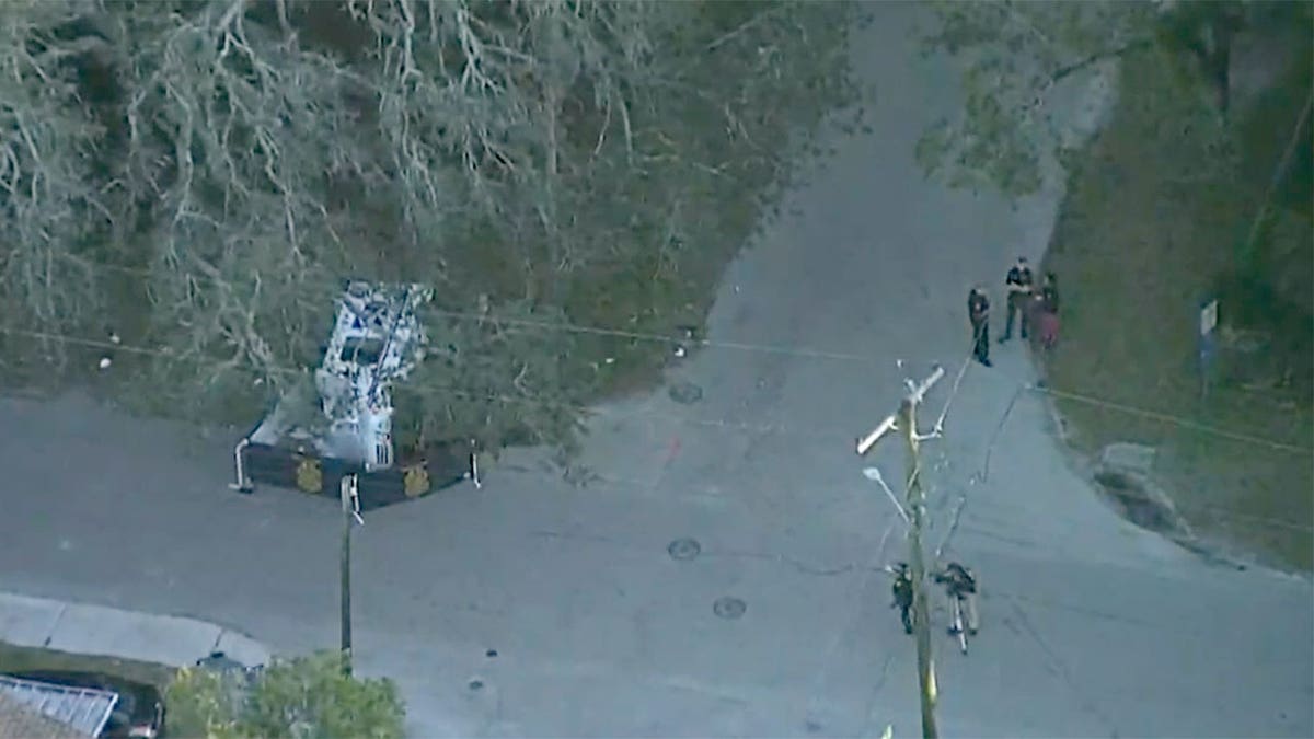 Aerial of USPS truck on side