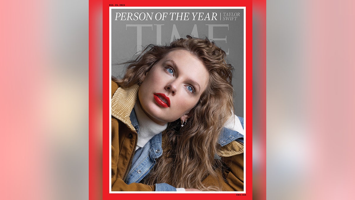 Taylor Swift on the cover of TIME looks up wearing a brown jacket