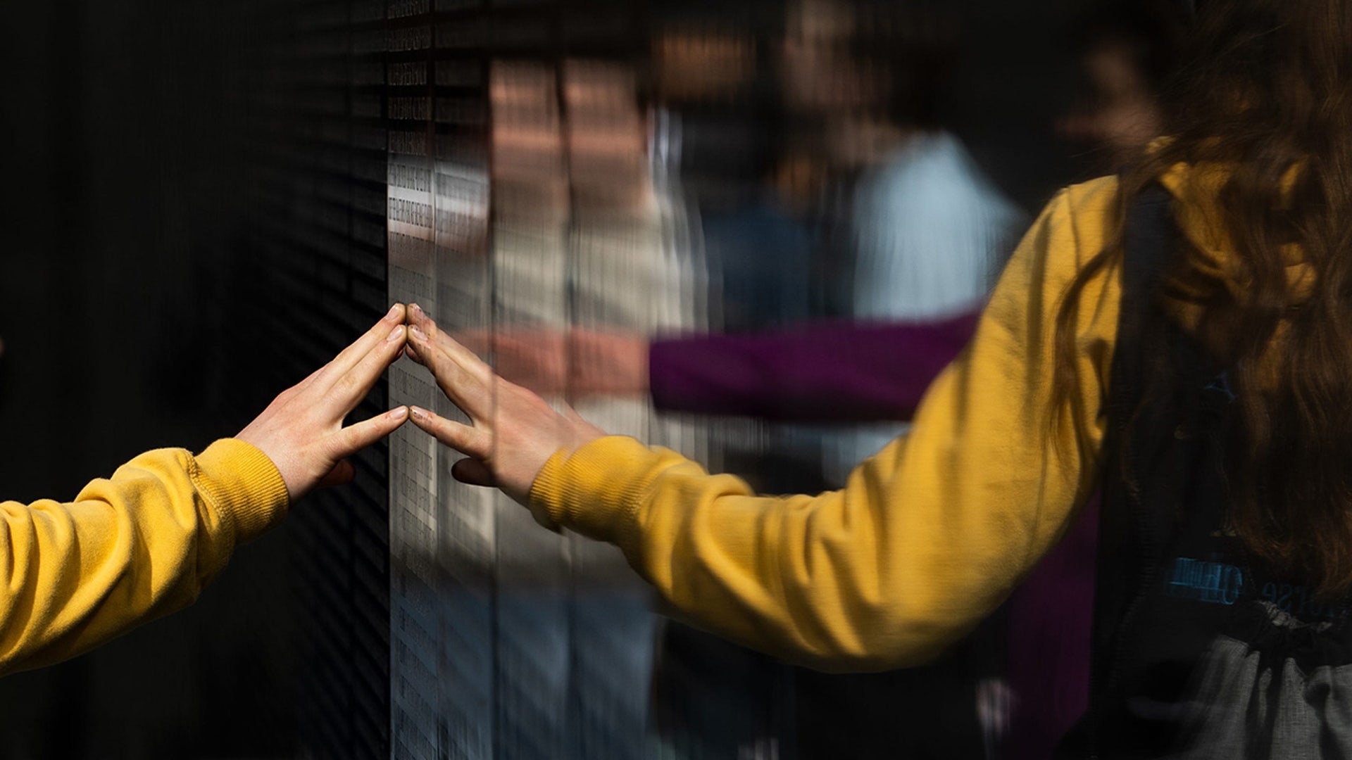 Visitors pay their respects at Vietnam Veterans Memorial