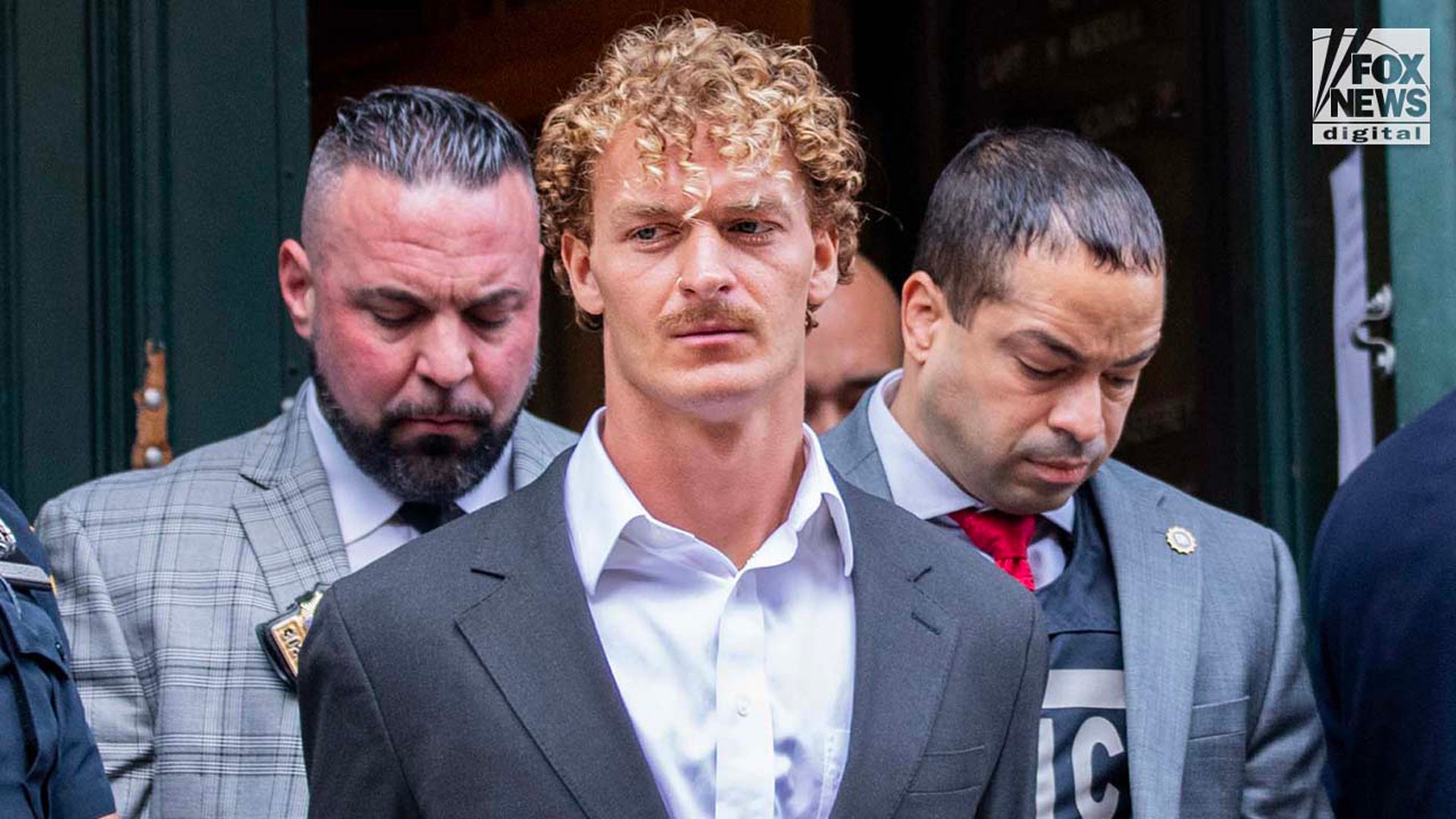 Daniel Penny exits a Manhattan police precinct.