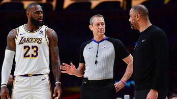 LeBron James, Rockets coach get into heated spat during game
