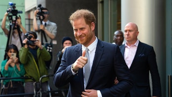 Prince Harry wins legal battle with UK publisher in phone hacking case