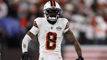 Browns' Elijah Moore appears to convulse after falling headfirst to ground on tackle