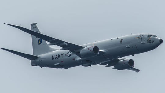 China's military says its fighter jets shadowed US Navy plane over Taiwan Strait