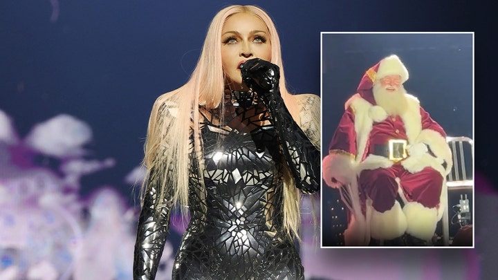 Santa Claus takes a fall during Madonna concert