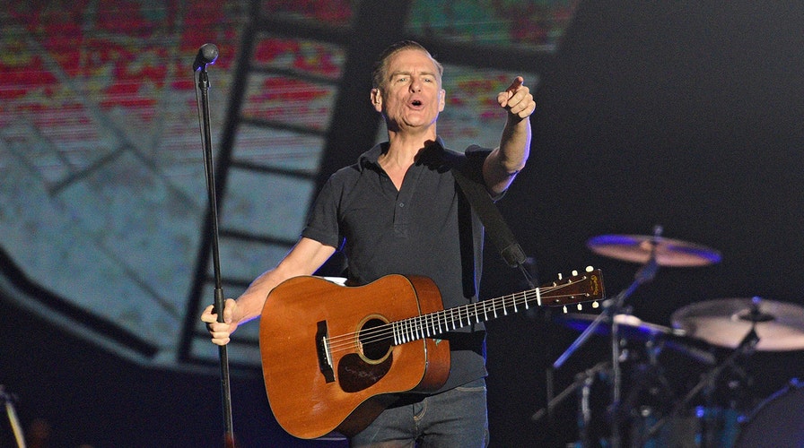 Bryan Adams was interrupted by a fan while performing 'Summer of '69'