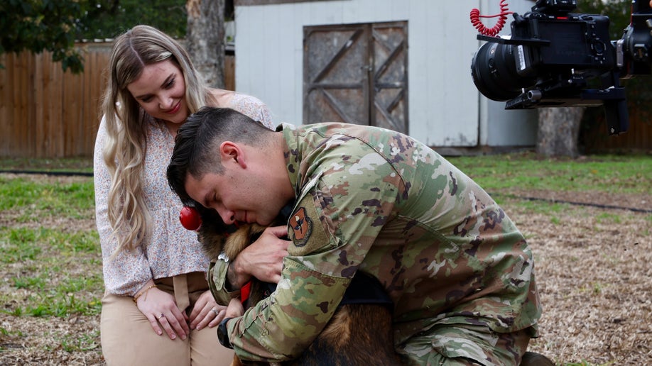 SSgt. Mike Alcala and his wife Brittany Alcala reunite with John