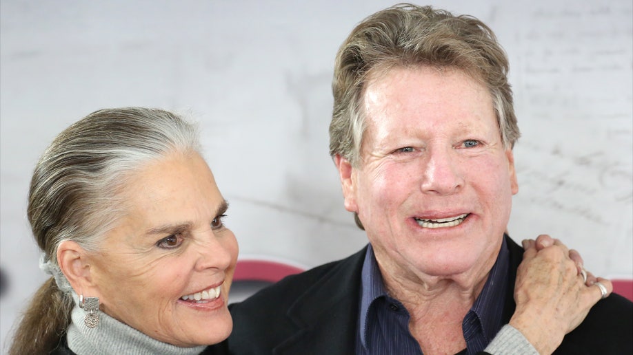 Ryan O'Neal and Ali MacGraw in a play together
