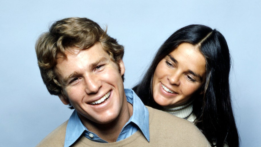 Ryan O'Neal and Ali MacGraw in a promo for "Love Story"